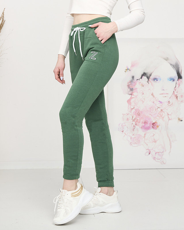 Royalfashion Zielone damskie spodnie dresowe z ociepleniem