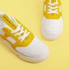 Białe buty sportowe z żółtymi wstawkami Polerine - Obuwie