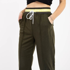 Ciemnozielone damskie luźne spodnie dresowe - Odzież 