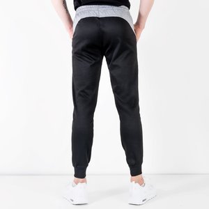 Czarno-szare męskie spodnie dresowe - Odzież