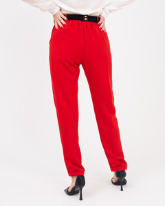Czerwone materiałowe spodnie damskie z paskiem - Odzież