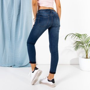 Granatowe damskie rurki jeansowe o długości 7/8 - Odzież