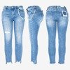 Niebieskie jeansy damskie z dziurami PLUS SIZE - Spodnie
