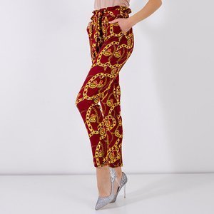 Royalfashion Bordowe damskie spodnie z printem