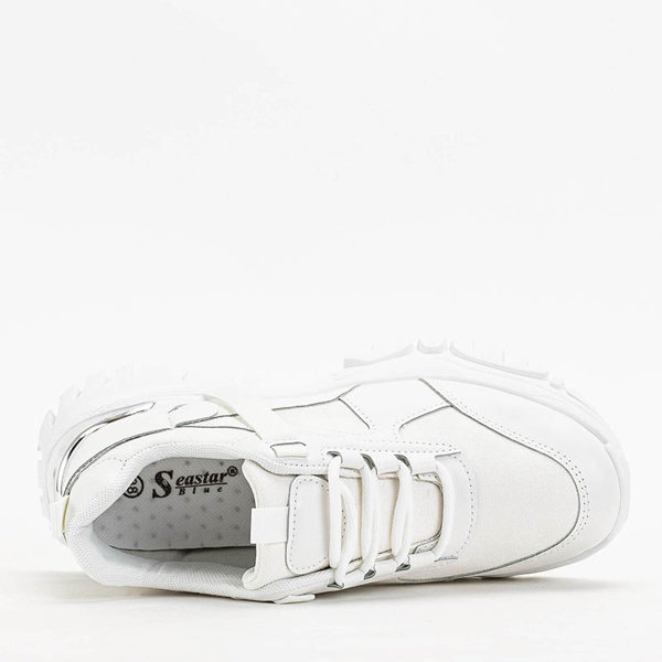 Білі жіночі кросівки Itega