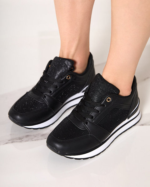 Чорне жіноче спортивне взуття Uzzuci- Взуття