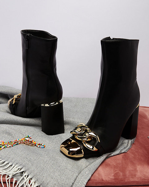 OUTLET Чорні жіночі чоботи на високих підборах з золотими прикрасами Amiop- Footwear