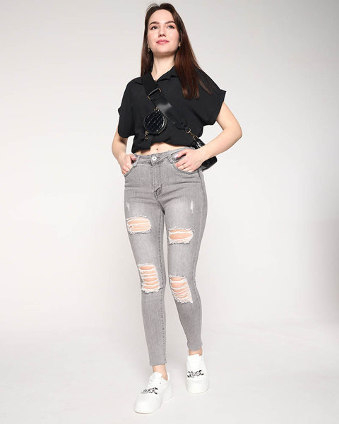 Сірі рвані жіночі джинси - Одяг