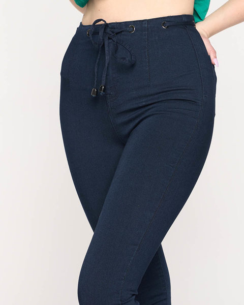 Темно-сині жіночі вузькі джинси з декоративним поясом